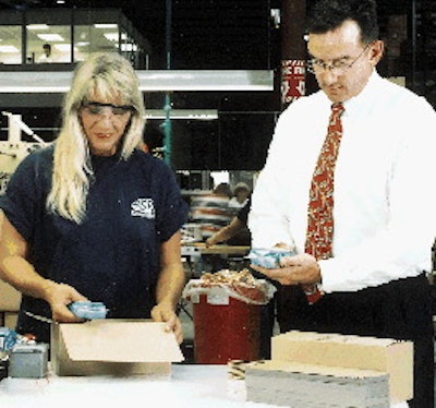 Jeff Coppola, vice president of logistics at ASR (above), inspects packages of razors as they come off the line. ASR packages o
