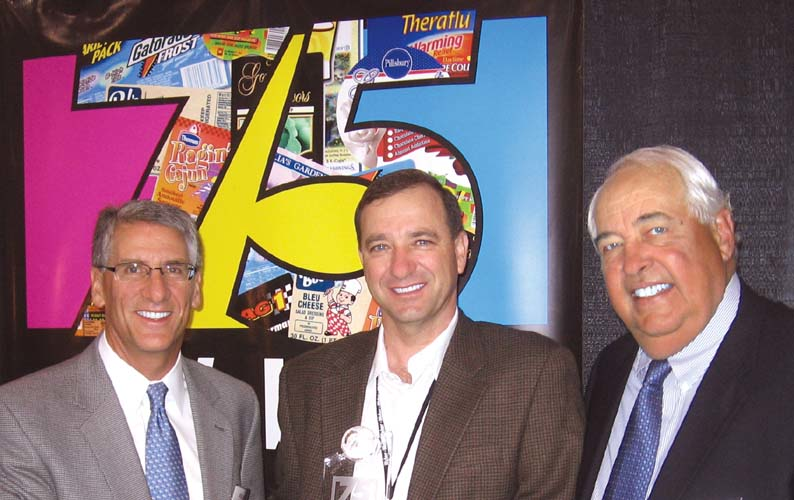 Joe Angel (left), VP/publisher, and Lloyd Ferguson (right), president, Summit Publishing Co., present Weber Marking Systems' pre