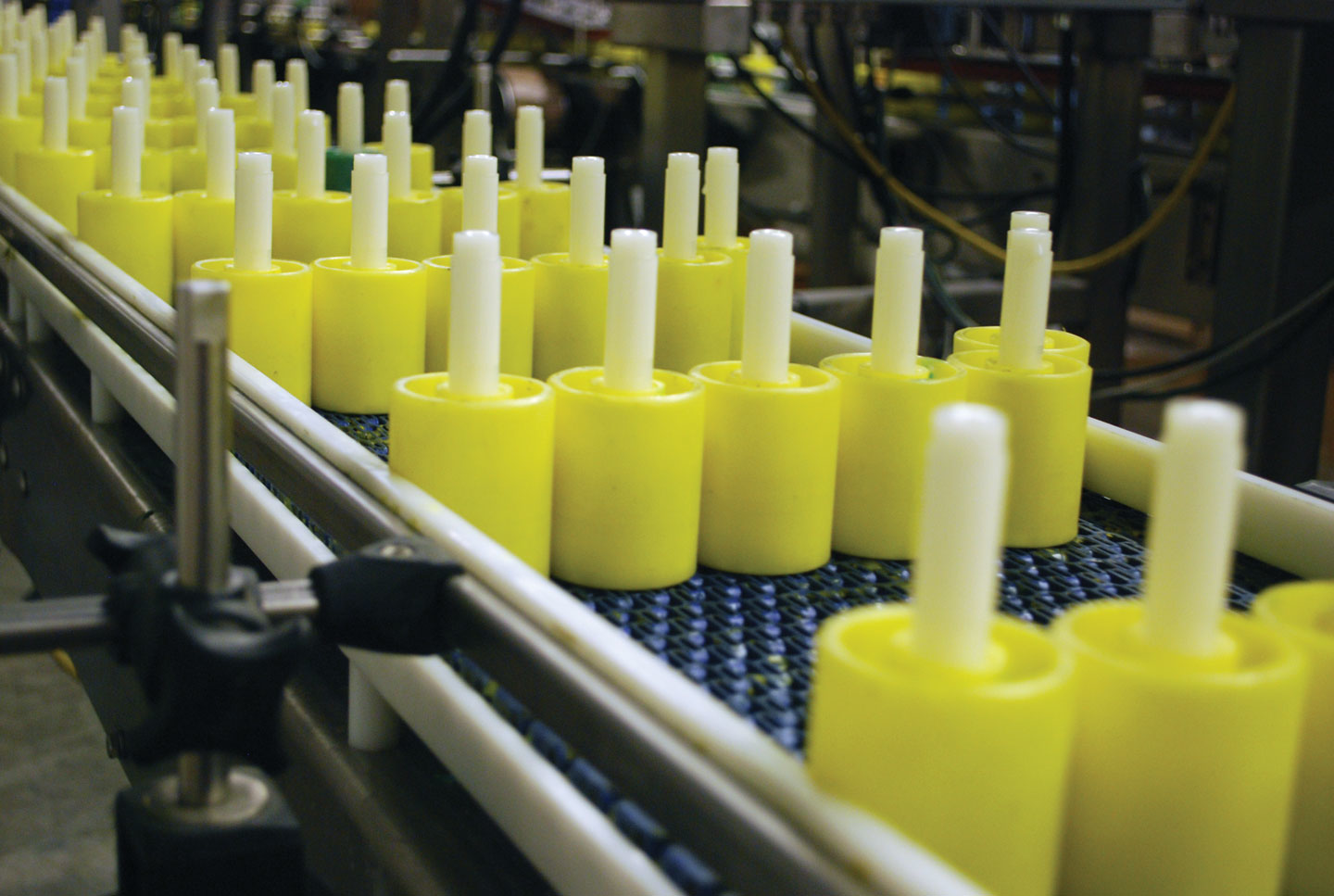 Northstar&rsquo;s new lip balm line relies on pucks to keep the slender containers upright during the filling and capping process.