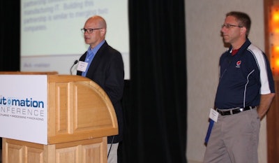 Bryan Cleal (left) and Jeff Russell address The Automation Conference.
