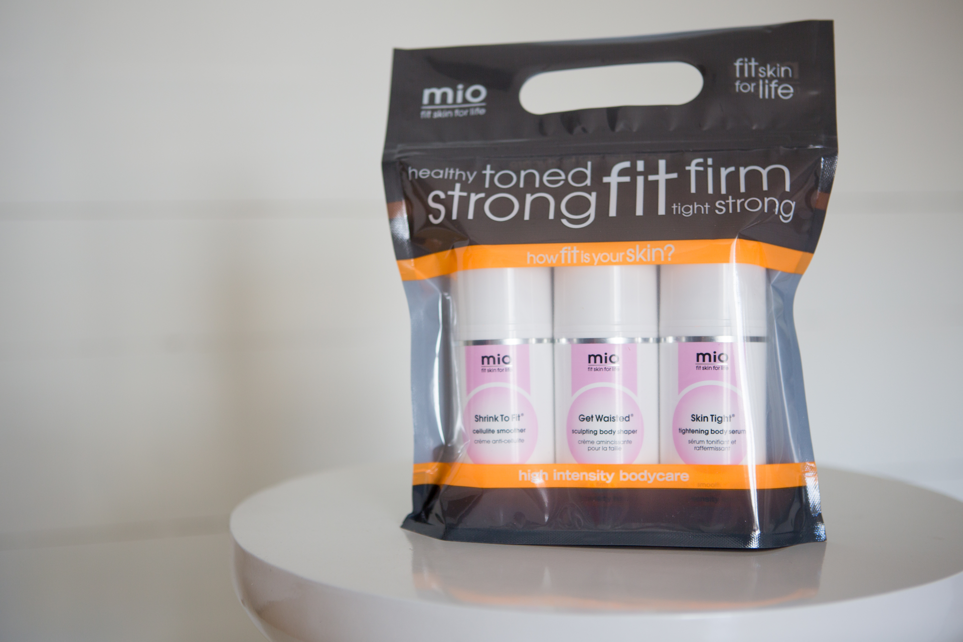 MIO Skincare&rsquo;s customized stand-up pouch with carry handle offers a sporty, modern appeal for Life Time Fitness club members.