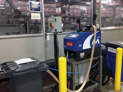 ALL-ELECTRIC. Shown here is one of the seven all-electric hot melt adhesive application systems running at the PepsiCo plant.