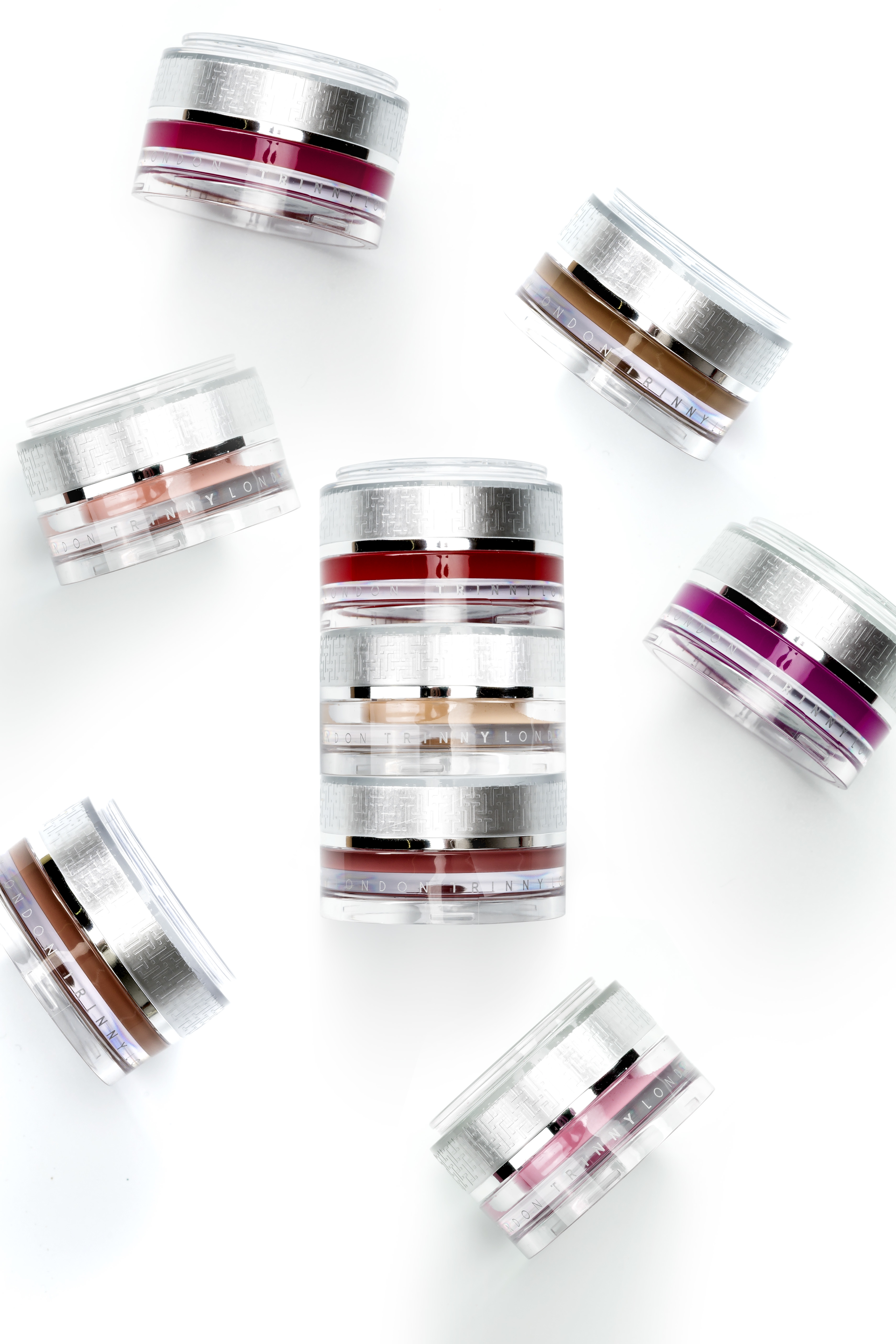 The makeup jar is customized with a click-fit functionality that allows it to attach to another jar to form a stack.