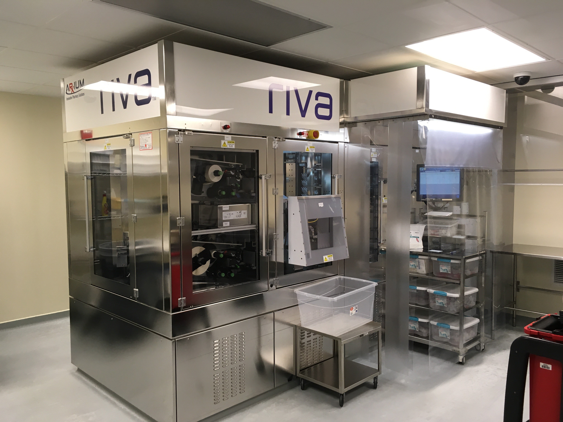 Two automated IV compounding systems sterile-fill liquids and lyophilized products into IV syringes and bags for administration to Mission Health patients.