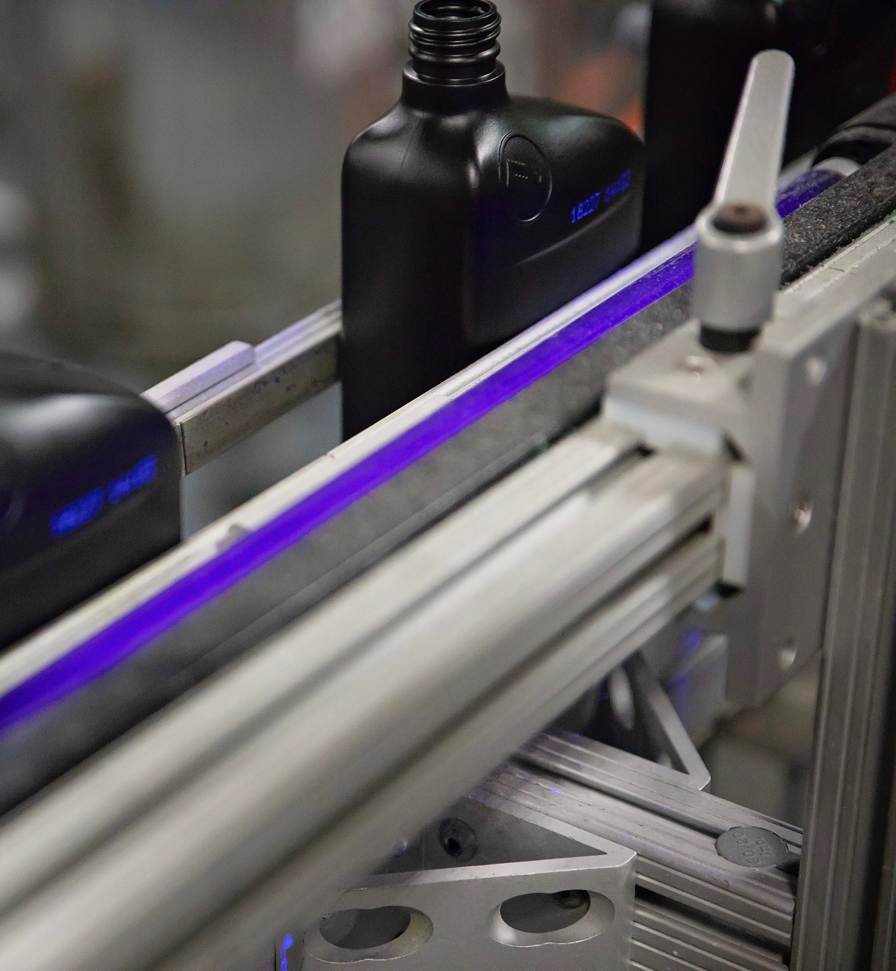 Warren runs an invisible ink that is illuminated by a UV light.