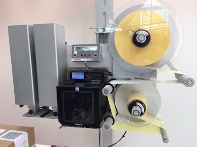 Stepper motors bring greater accuracy to this corner wrap labeler.