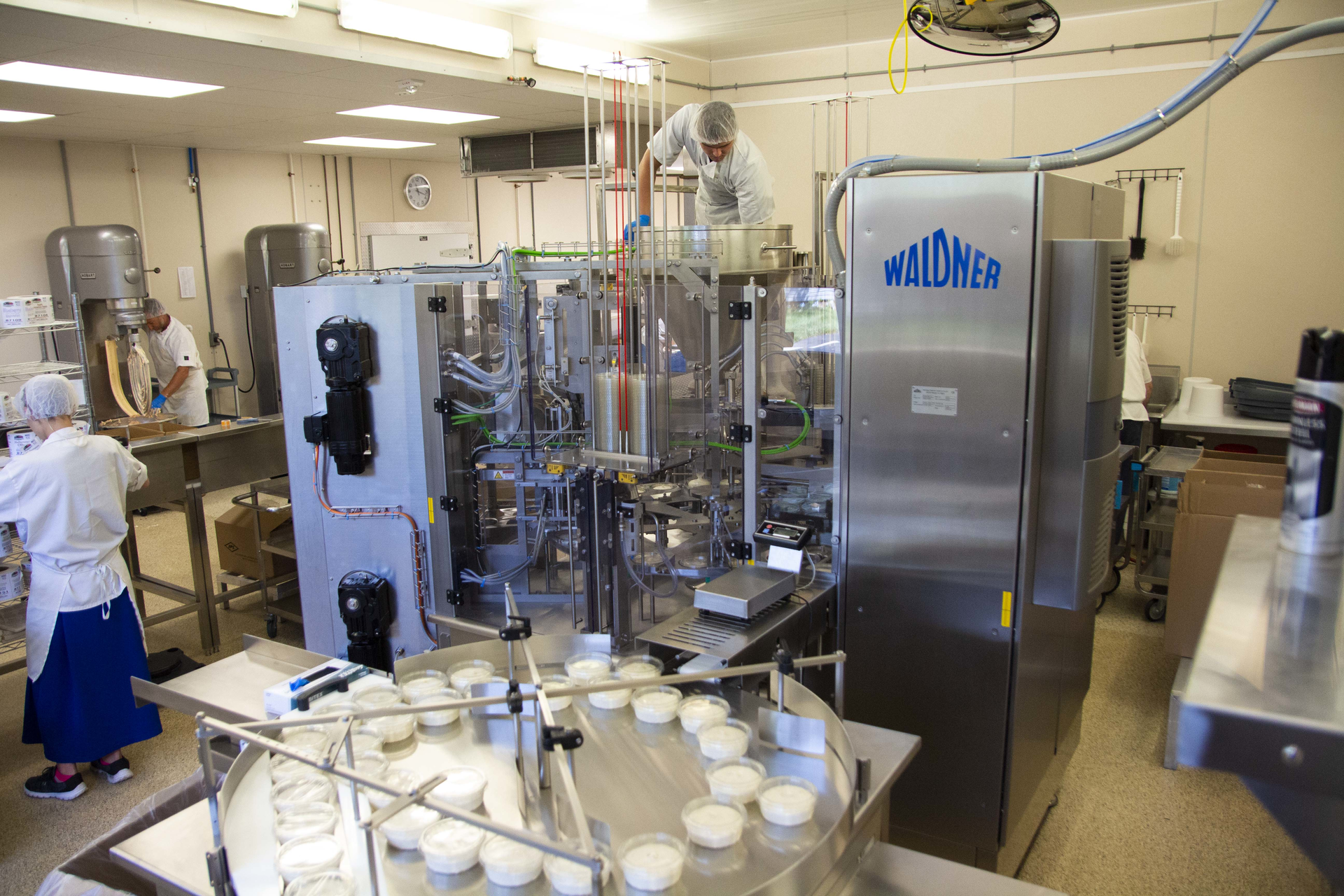 J&L uses the rotary DOSOMAT to fill, seal, and cap its cream cheese spreads in 8-oz retail cups at 75 cups/min.