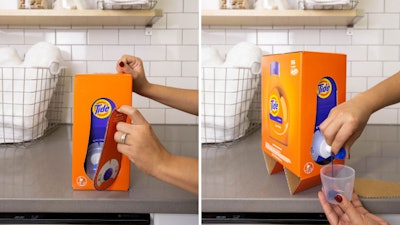 The dispenser nozzle of the Tide Eco-Box is inside the footprint of the package when shipped, and then the consumer pulls it outside of the footprint to use the detergent.