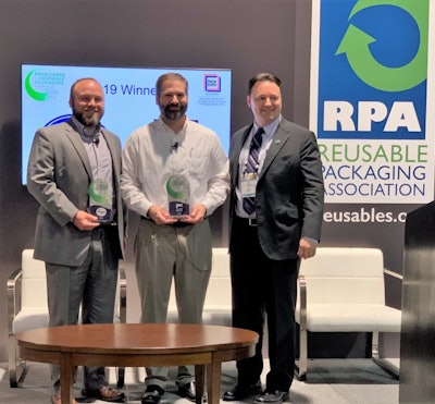 Accepting the Excellence Award on behalf of The Kroger Company is Joe O'Connor (left) and Polymer Logistics is Paul Pederson (center).