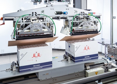 Ready for delivery to customers: The shipping cases containing the gift packaging are sealed by F2 robots.