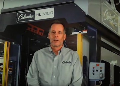Ted Yeigh, Sales Director, Palletizer Division for Columbia Machine, Inc., answers attendee questions during the company's live demo.