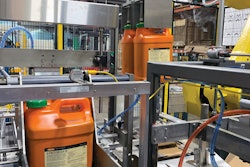 The robot picks two containers at a time and places them gently into the corrugated reshippers.