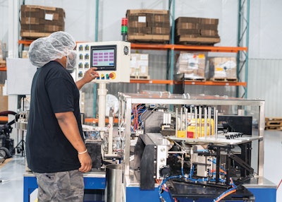 Pouches coming off of the pouch-making system go into this spout inserter.
