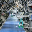 Spider robots sit atop a conveyor on one of Serpa’s intermittent cartoners.