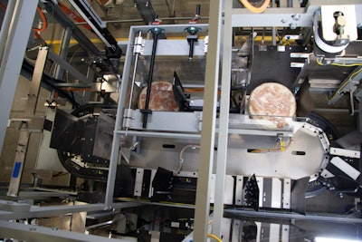 With the M3000 case packer for stacks of frozen pizzas, Brenton chose to use mechatronics to replace numerous traditional mechanical components, which proved more efficient and dynamic than adding robotics.