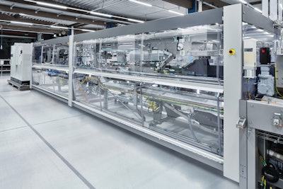 The wraparound case packer includes a fully automated corrugated partition inserter.
