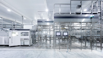 Shown here is the PET bottle blowing and filling equipment. Like the glass line, bottle sizes filled on this blow/fill line include 330-, 500-, and 800-mL.