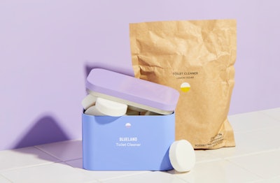 Blueland's new toilet cleaner product, in tablet form, also comes in a compostable pouch with a Forever Tin for storage.