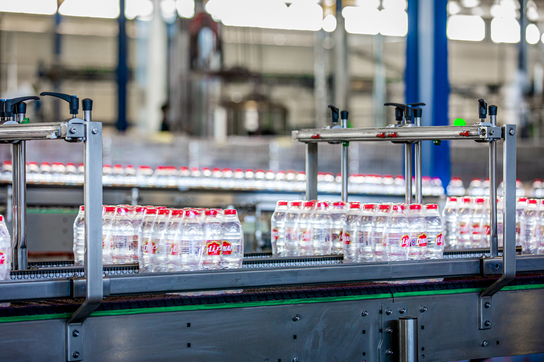 The line achieves speeds of 48,000 bottles/hour (bph).