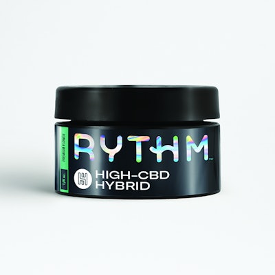 While pouches or HDPE jars are more common for cannabis flower, RYTHM uses a black-painted glass jar and matte-finish p-s label printed with prismic text to convey the premium quality of the product inside.