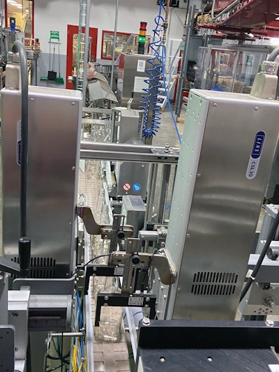 CSL30 laser coding equipment puts date and lot code information on the front and back of each bottle.