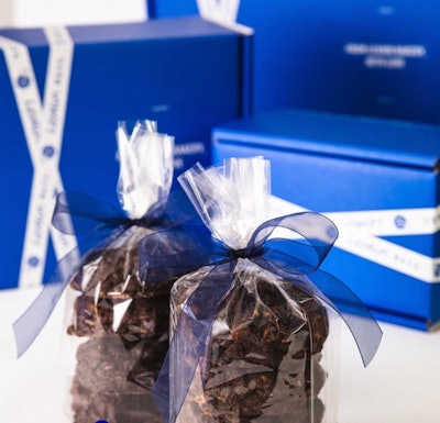 The outside of the box is printed in one color—Levain’s signature blue—with the white of the box creating a ribbon effect.