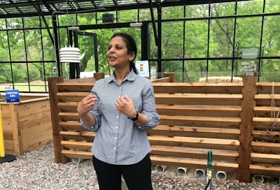 Technical Director, PepsiCo R&D Senior Fellow Sridevi Narayan-Sarathy led a recent media tour of the Greenhouse Learning Center, where the R&D team is field testing, measuring, and analyzing compostable packaging materials on-site to speed the rate of innovation.