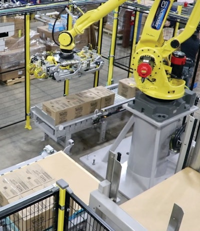 In addition to placing cases on a pallet (shown), the end effector on the robotic palletizing arm can also pick and place an empty pallet into the case-loading station or pick a corrugated slip sheet and place it on top of a finished pallet just before it’s conveyed to a stretch wrapper.