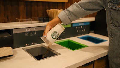 Cups are then emptied of ice or remaining beverage, prior to being scanned and accepted by the bin.