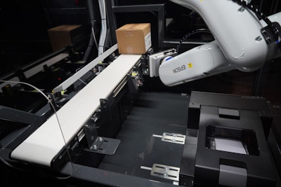 Custom self-contained labeling cell with an Epson VT6L All-in-One 6-Axis Robot and Epson ColorWorks CW-C6000P Color Inkjet Label Printer and custom label track, toolhead, and conveyor.
