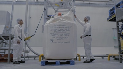 The process of converting to a liquid product begins with the discharge of the large bags of granulated sugar.