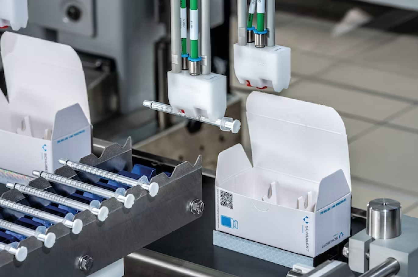 In Lundbeck's operation, a robot picks up one pipette for each carton of vials.