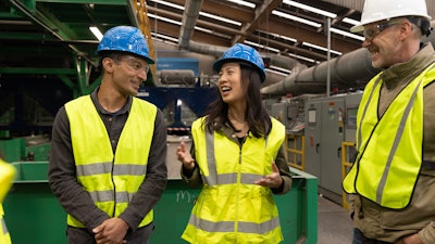 Glacier co-founders Areeb Malik (left) and Rachel Hu (center) speak with Amazon Climate Pledge Principal Nick Ellis (right) at a Phoenix-area municipal recycling facility.