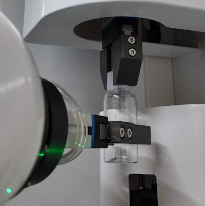 Caps are torqued off prior to filling, then on after filling in a capping chuck module.