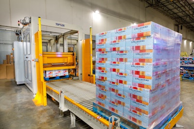 Bettaway’s automated TopTier palletizer stacks and prepares cartons of Nestlé’s San Pellegrino Essenza mineral water on pallets destined for club stores.
