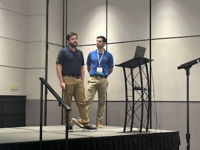 Grantek's Dylan De Anna (left), accompanied by George Kokkinias, Grantek Operations Manager (right), shared the benefits and current hurdles to overcome in integrating AI in CIP processes.