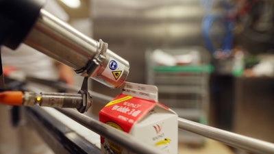 A carton of Wapnö milk receives its batch and best-before code using the IQJET continuous inkjet printer.