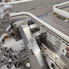 Multi-Conveyor's 180-degree C-chute product reorientation