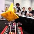 Students demonstrate their invention at the Future Innovators Robotics Showcase at PACK EXPO Las Vegas 2023.