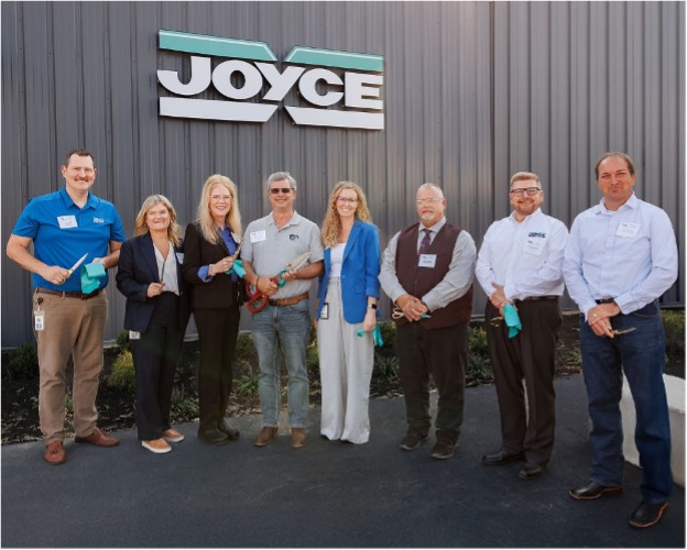 Joyce/Dayton Corp. executives and local dignitaries cut the ribbon at the newly expanded Portland, Indiana production facility. (L to R: Kyle Roe, Plant Manager; Julie Teeters, VP of HR; Dianne Trentman, COO; Brad Weiss, President and CEO; Jessica Rowden, CFO; Jeff Westlake, Mayor of Portland; Michael Boehm, VP of Revenue; and J.D. Prescott, Indiana State Representative)