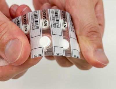 Samples of push-through blister packs with brittle lidding material.