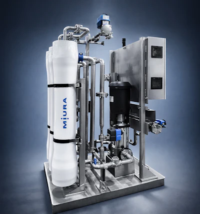 Industrial water treatment system with white Miura tank and complex metal piping