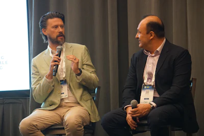 From left, Scott Byrne of Sonoco and Teo Medellin of Procter & Gamble.