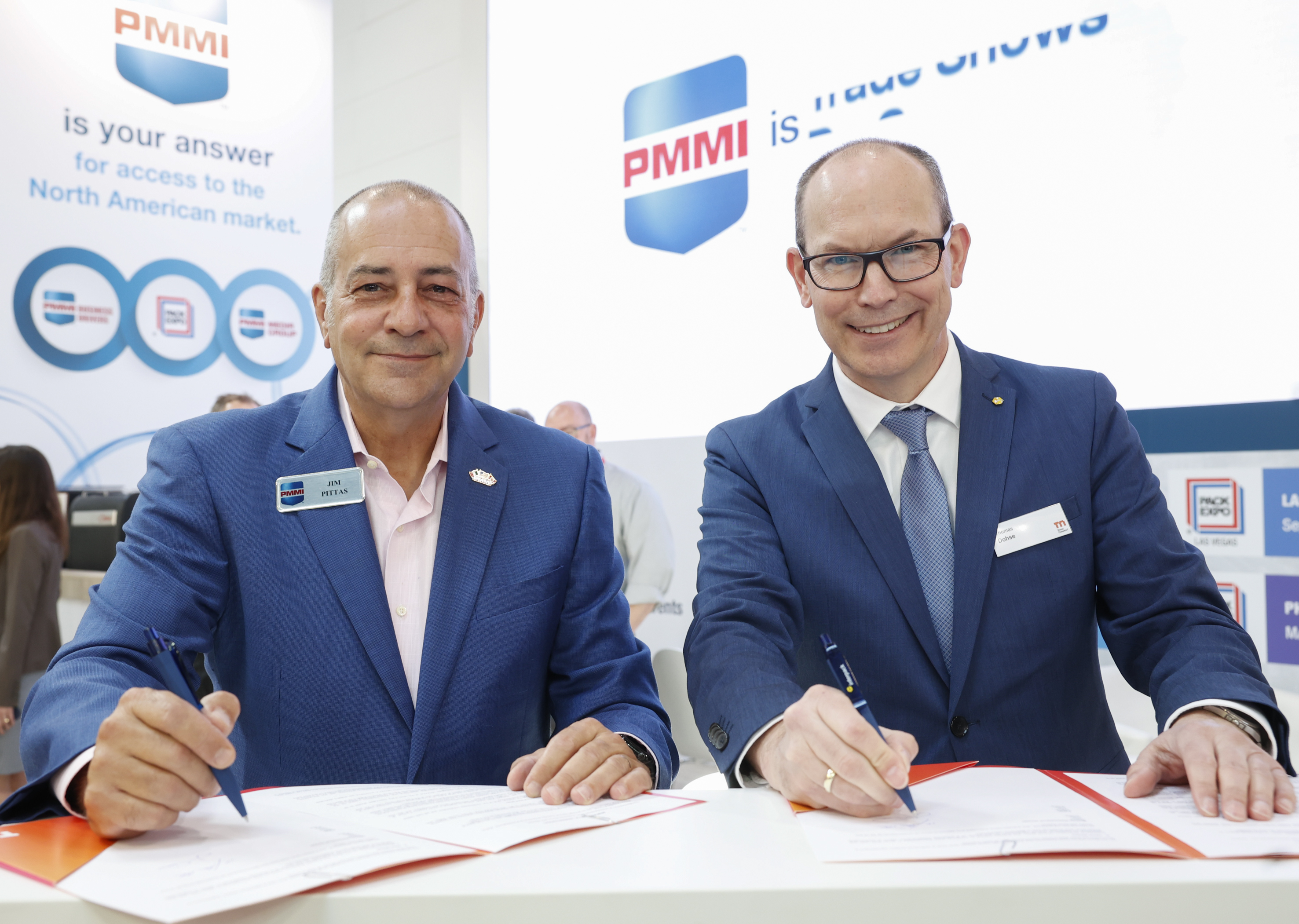 Jim Pittas (left), president and CEO of PMMI, The Association for Packaging and Processing Technologies, and Thomas Dohse, director of interpack.