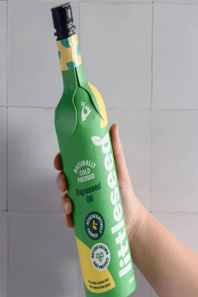 The packaging utilizes the Frugal Bottle, which is composed of approximately 94% recycled paperboard.