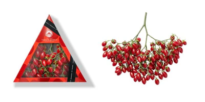 The format is used to contain a tomato branch rather than loose produce, allowing the packaging to showcase the product’s natural form while providing protection during transport and display.