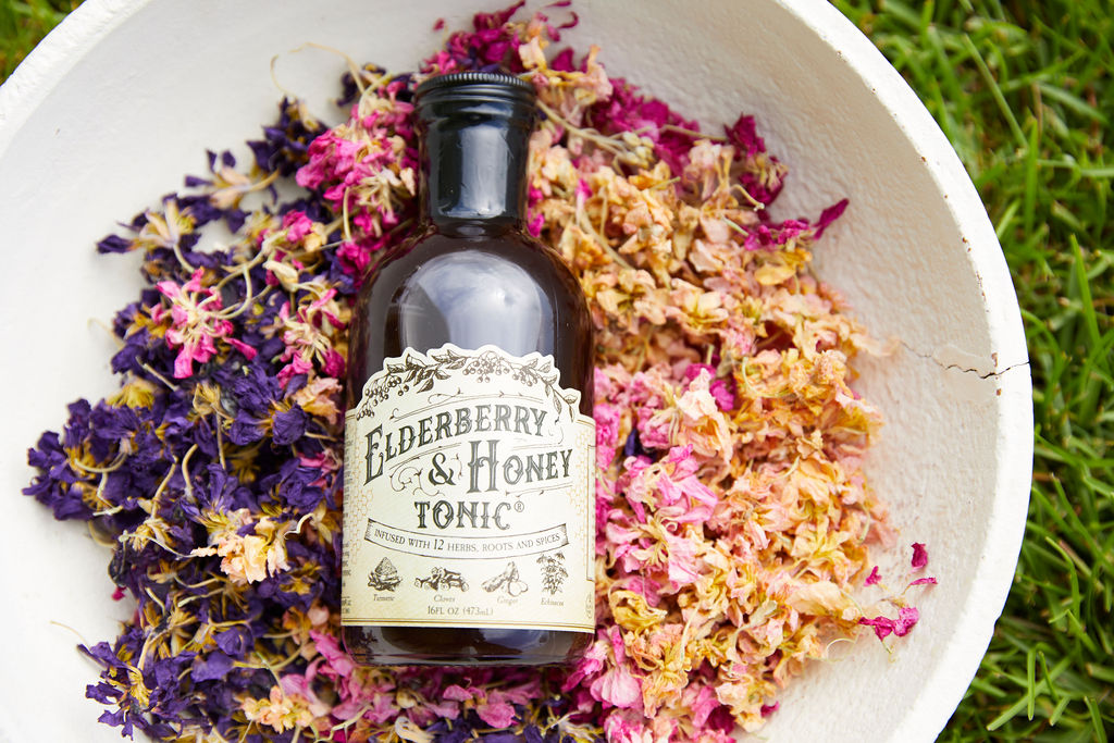 Roots & Leaves&rsquo; Elderberry & Honey Tonic, packaged in a glass bottle with apothecary-inspired graphics, reflects the brand&rsquo;s focus on ingredient integrity, sustainability, and traditional herbal remedies.