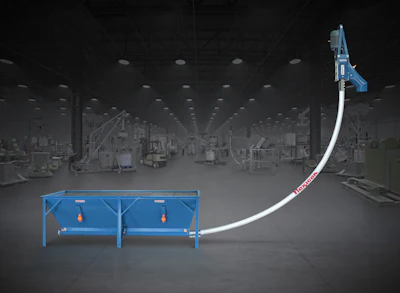 Industrial dust collection system with blue workstation table and overhead pneumatic arm in warehouse facility