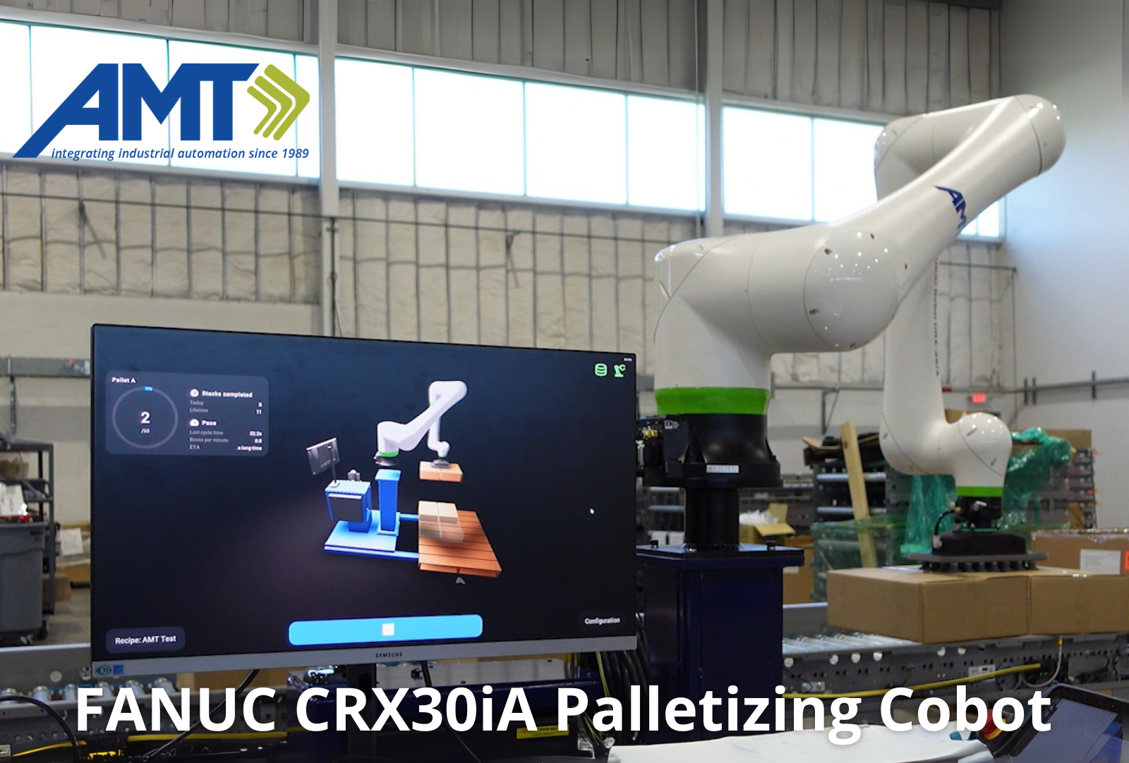 FANUC CRX30iA palletizing cobot with control display in AMT industrial facility