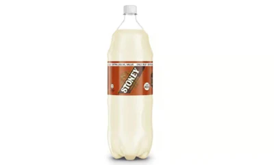 Stoney ginger beer plastic bottle with brown and cream label on white background